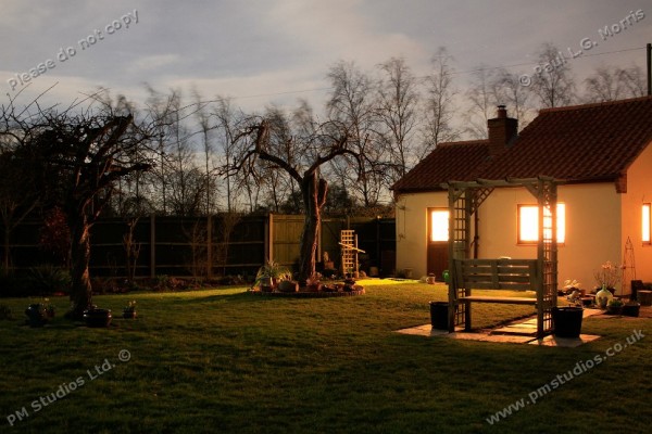 basic cottage by moonlight